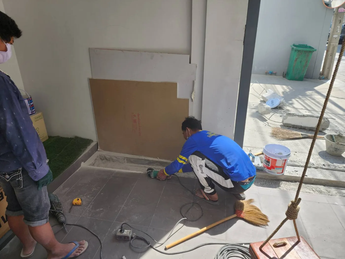 Installer preparing the motor base on site